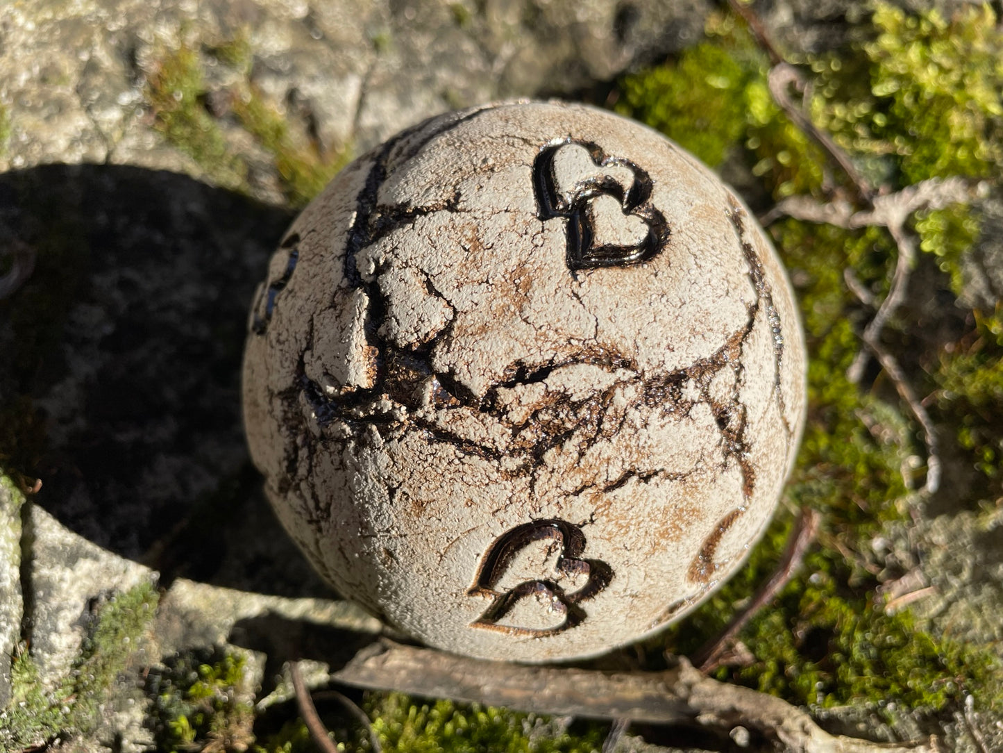 Gartenkugel mit verschiedenen Motiven